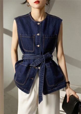 Losse Blauwe Knoopsluiting In De Taillezakken En Denim Vest Zonder Mouwen